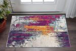 2' X 5' Gray and Ivory Abstract Area Rug