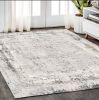 5' X 8' Gray and Ivory Abstract Power Loom Area Rug